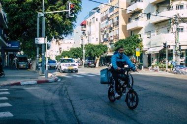 Tel Aviv Israel December 22, 2020 View of unidentified people rolling through the streets of Tel Aviv during lockdown and the Coronavirus outbreak hitting Israel