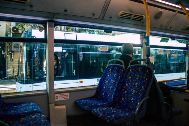 Tel Aviv Israel December 22, 2020 View of unidentified Israeli person with a face mask to protect themself travelling by city bus during lockdown and Coronavirus outbreak hitting Israel