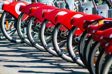 Seville Spain July 09, 2021 Accessible bicycles to hire for short periods of time, usually for a few hours parked in the street and part of the public transport system of Seville