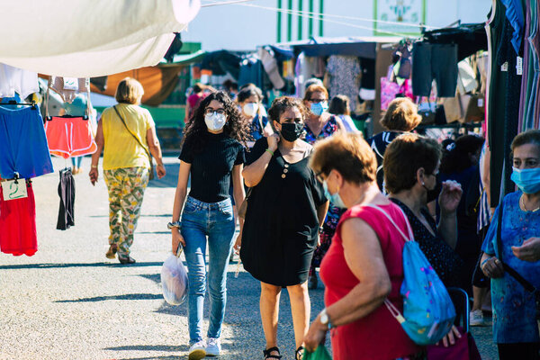 Carmona Spain July 19, 2021 Unidentified Spanish people with face mask shopping at local market in downtown during Coronavirus outbreak hitting Spain, wearing a mask is mandatory