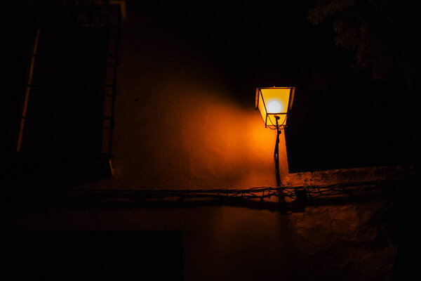 Carmona Spain July 23, 2021 Street lamp in the narrow streets in the town of Carmona called The Bright Star of Europe, the town shows a typical narrow and meandering Arabic layout