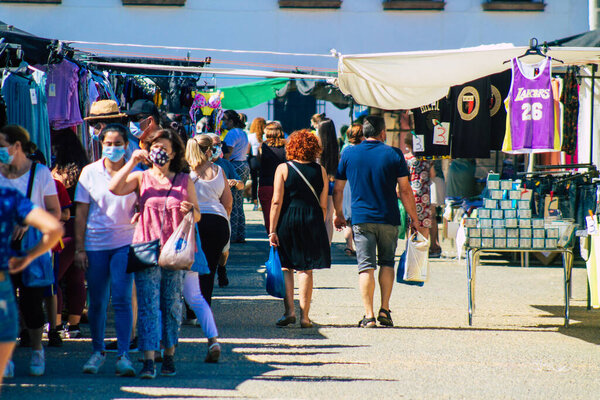 Carmona Spain July 26, 2021 Unidentified Spanish people with face mask shopping at local market in downtown during Coronavirus outbreak hitting Spain, wearing a mask is mandatory