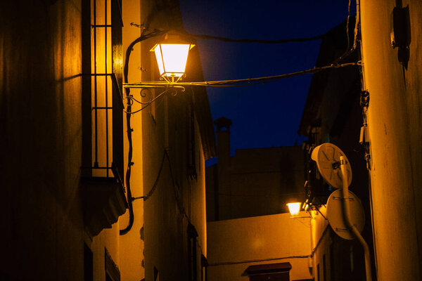 Carmona Spain July 28, 2021 Night street in town of Carmona called The Bright Star of Europe, the town shows a typical narrow and meandering Arabic layout