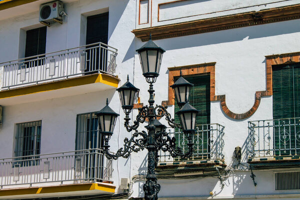 Carmona Spain July 30, 2021 Street lamp in the narrow streets in the town of Carmona called The Bright Star of Europe, the town shows a typical narrow and meandering Arabic layout
