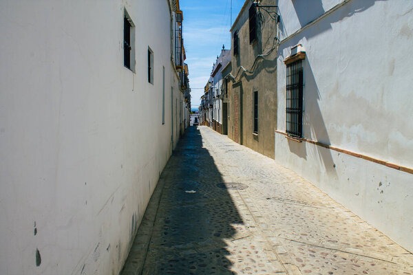 Carmona Spain July 31, 2021 Narrow street in town of Carmona called The Bright Star of Europe, the town shows a typical narrow and meandering Arabic layout