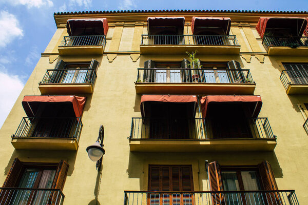 Seville Spain August 10, 2021 Facade of a building in the streets of Seville, an emblematic city and the capital of the region of Andalusia, in the south of Spain