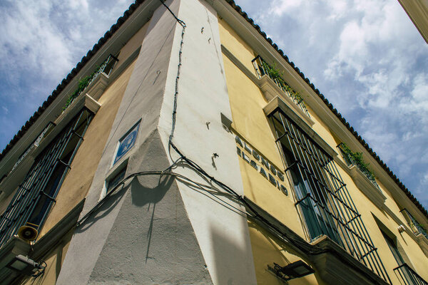 Seville Spain August 10, 2021 Facade of a building in the streets of Seville, an emblematic city and the capital of the region of Andalusia, in the south of Spain