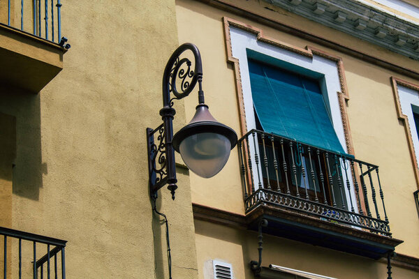 Seville Spain August 11, 2021 Street lamp in the streets of Seville, an emblematic city and the capital of the region of Andalusia, in the south of Spain