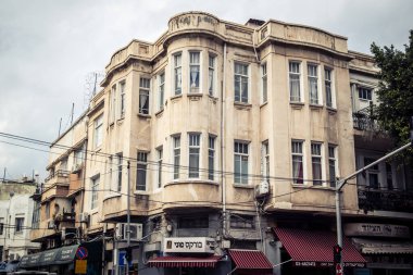 Tel Aviv, İsrail, 19 Ocak 2026 Florentin Mahallesi, şehrin eşsiz mimari mirasını betimliyor. Tarihi Bauhaus 'tan modern konut tasarımlarına kadar uzanan bu yapılar.