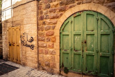 Hebron, Batı Şeria, 29 Ocak 2026 Mühürlü Kapılar Eski Şehir çorbasının yanında. Askeri kısıtlamalar ve kapatmalar yerel işletmeleri kapatmaya zorladı ve tarihi pazarı boş bıraktı.