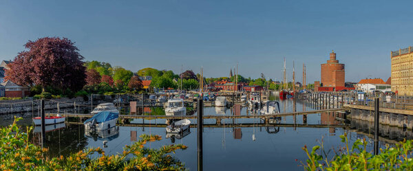 Panorama Eckernforde fishing harbour, round silo in port town Eckernfrde and popular tourist destination on the coast of the Baltic Sea in northern Germany, Rendsburg-Eckernfrde, Schleswig-Holstein