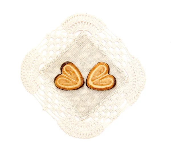 Shortbread cookies in the form of hearts on a napkin — Stock Photo, Image