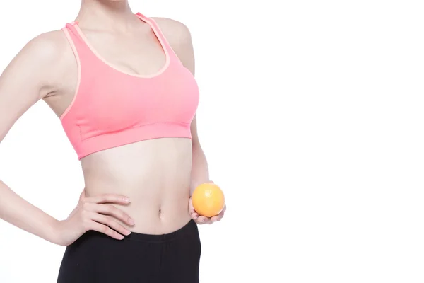 Mujer sosteniendo naranja — Foto de Stock