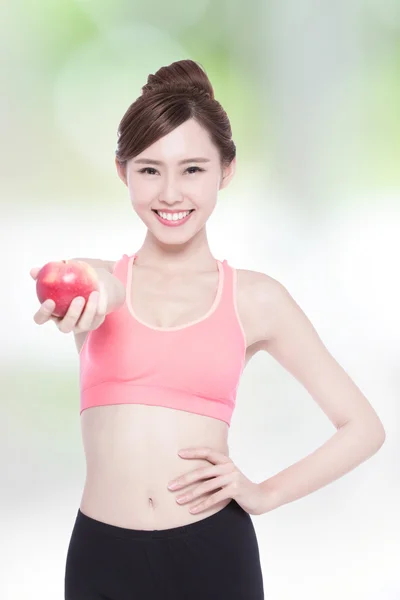 Smile woman hold apple — Stock Photo, Image