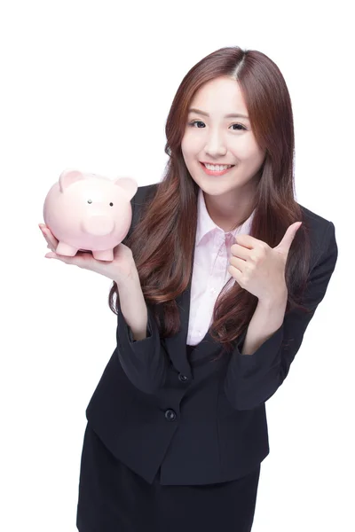 Mulher de negócios com banco porquinho — Fotografia de Stock