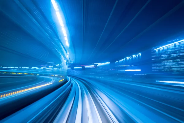 Túnel con desenfoque de movimiento de una ciudad —  Fotos de Stock