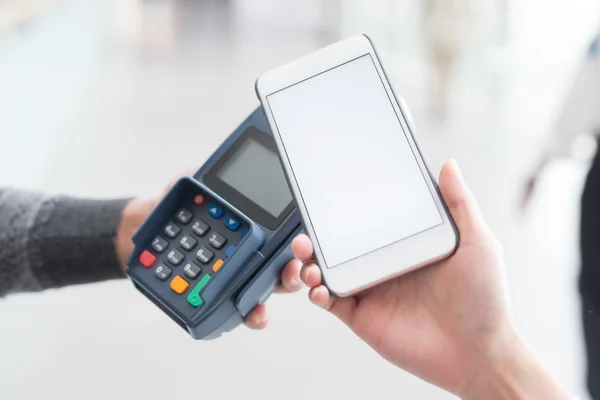 Customer paying  by cellphone — Stock Photo, Image