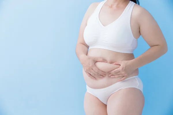 Mulher com sobrepeso de pé — Fotografia de Stock