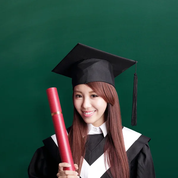 Smiling  student holding her diploma — Stock Photo, Image
