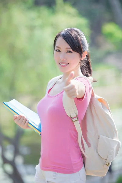 Student showing  thumb up gesture — Stock Photo, Image