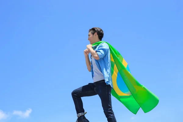 Man holding brazilian  flag — Stock Photo, Image