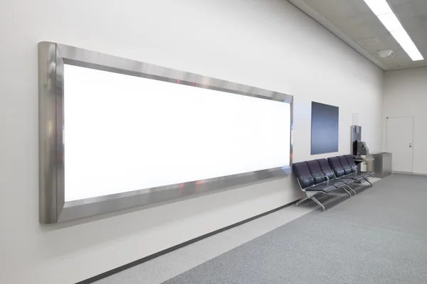 Leeg reclamebord in luchthaven — Stockfoto