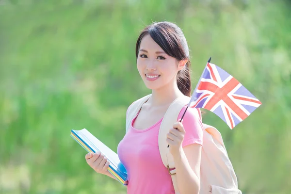 Niña sosteniendo bandera británica — Foto de Stock