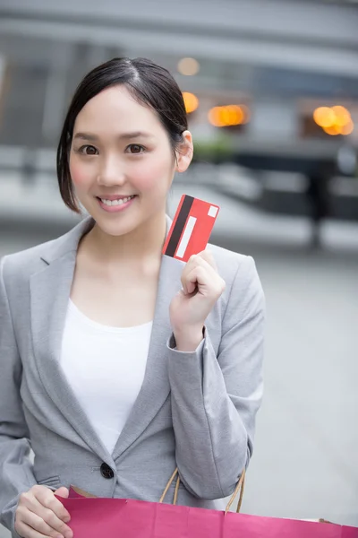 Businesswoman holding  credit card — Stock Photo, Image