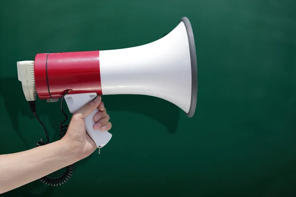 Man holding loudspeaker — Stock Photo, Image