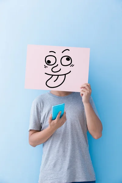 Man holding funny expression billboard — Stock Photo, Image