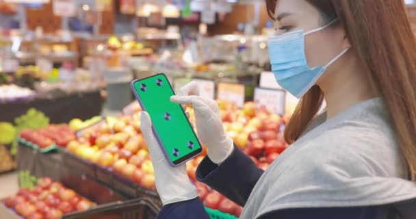 Smartphone écran vert en magasin — Video