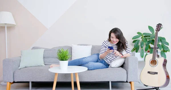 Pretty Asian Woman Use Smart Phone Feel Happy Sofa Home — Stock Photo, Image