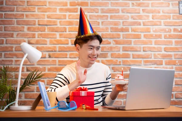 Asian Young Man Wearing Birthday Hat Has Video Chat Online — Stock Photo, Image