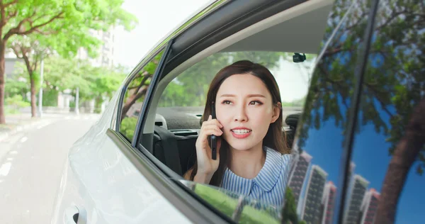 Asian Successful Business Woman Speak Smart Phone Car Look Out — Stok fotoğraf