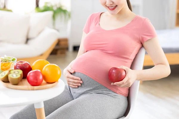 Proper Nutrition Concept Close Asian Pregnant Woman Sitting Chair Holding — Stock Photo, Image