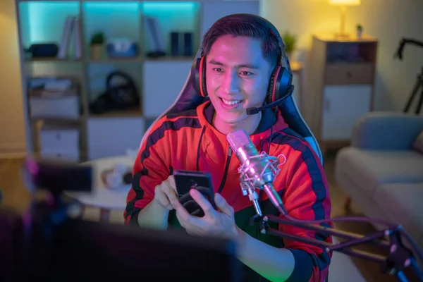 Young Asian Pro Gamer Have Live Stream Play Mobile Game — Photo