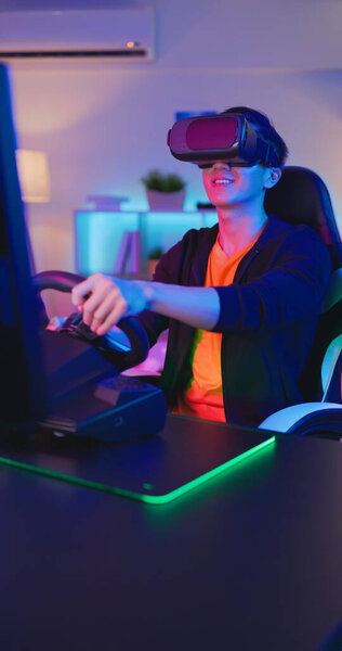 Asian Cyber Sport Gamer Play Car Racing Game Wearing Glasses Stock Picture