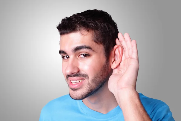 Young student listen by ear — Stock Photo, Image