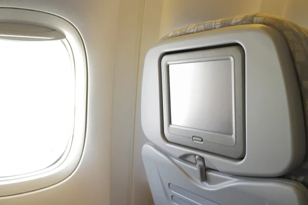 LCD экран в сиденье самолета — стоковое фото