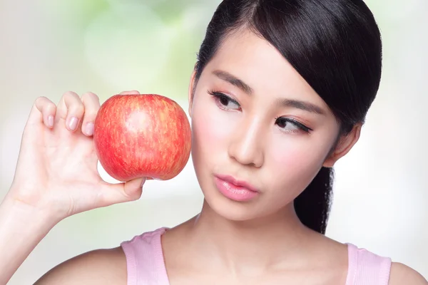 Beautiful young woman hold red apple — Stock Photo, Image