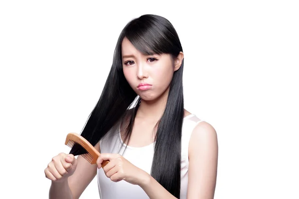Mujer infeliz cepillo pelo — Foto de Stock