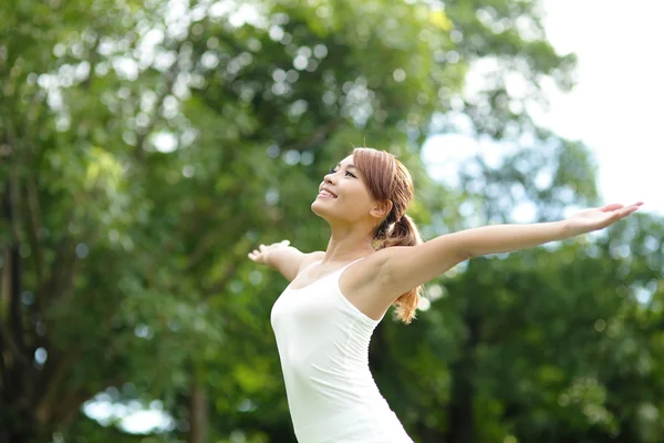 Girl raising her arms up — Stock Photo, Image