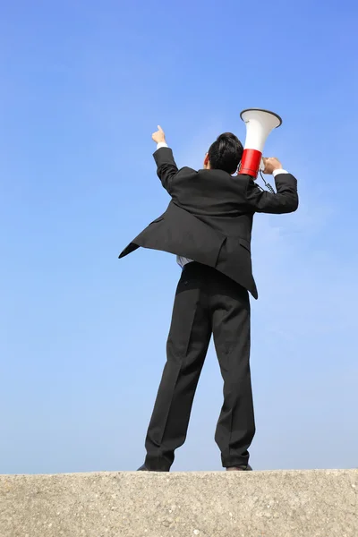 Business man using megaphone — Stock Photo, Image