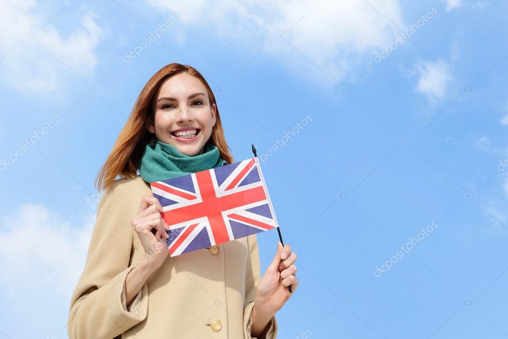 Woman holding British flag Stock Photo by ©ryanking999 64805133