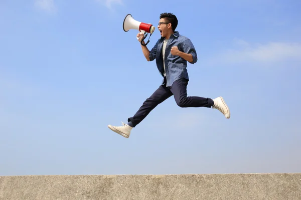 Man jumping and shouting — Stock Photo, Image