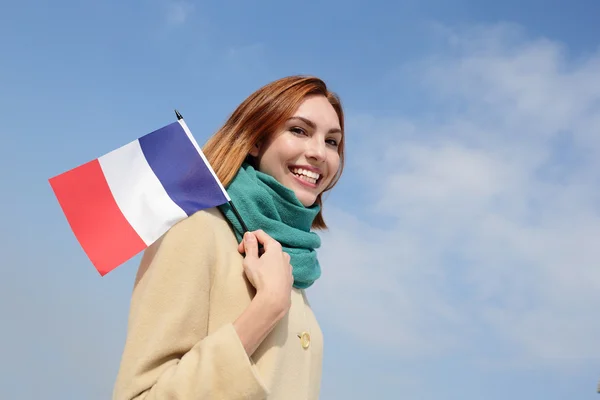 Femme tenant le drapeau français — Photo