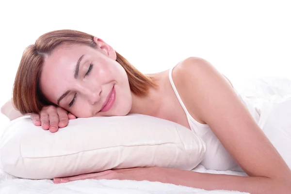 Frau schläft auf Bett — Stockfoto