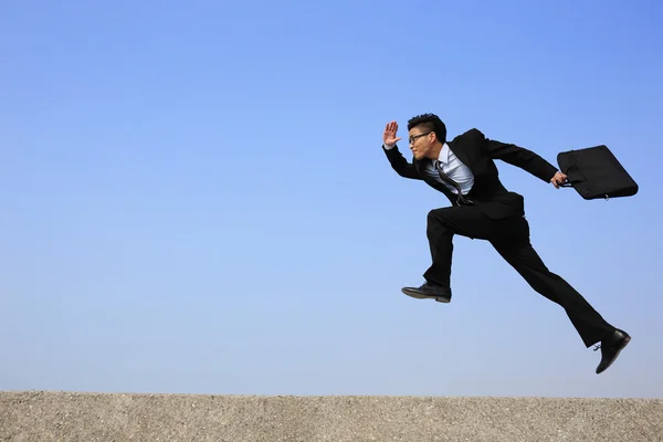 Business man jumping — Stock Photo, Image