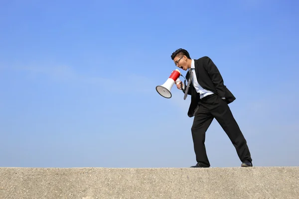 Business man using megaphone — Stock Photo, Image