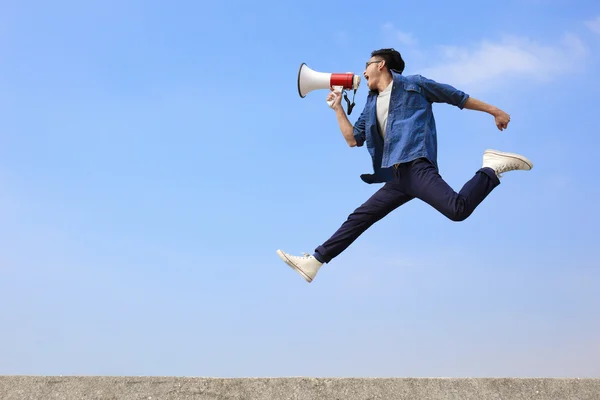 Man jumping  and shouting — Stock Photo, Image